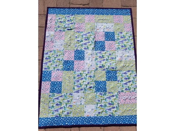 Hippos Baby Quilt in Light Greens, Blues, and Pinks