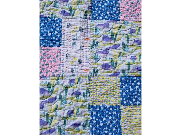 Hippos Baby Quilt in Light Greens, Blues, and Pinks